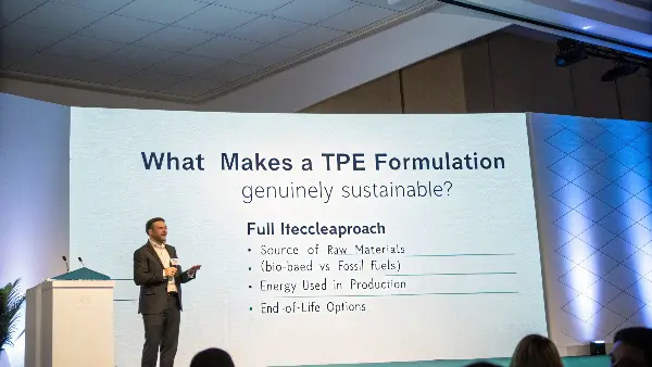 A leaf icon superimposed over a raw TPE material, symbolizing bio-based and eco-friendly properties.